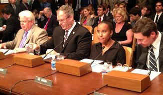 Jennifer Cari-Green testifies at Budget Committee hearing.